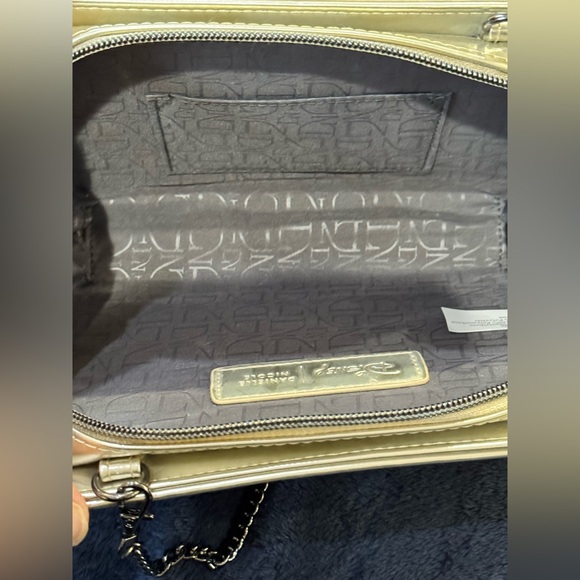 Danielle Nicole Disney’s Snow White book like
Clutch crossbody bag